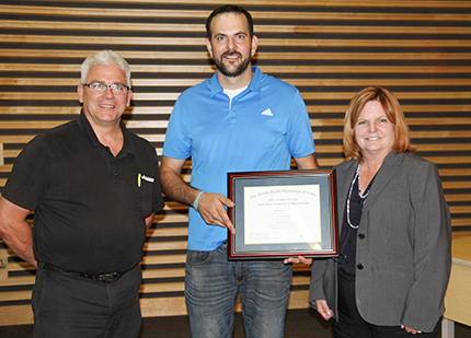 Mitch Smith with Milan Steel Systems tooling manager Doug McCormick and WCC Dean of Apprenticeships and Skilled Trades Marilyn Donham.