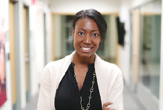 WCC alumna Aisha Bowe poses before the “From Washtenaw to NASA” lecture she presented on campus